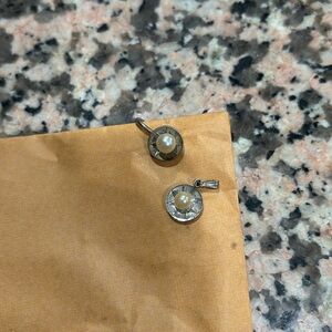 Vintage pearl pendant and singular screwback earring